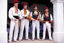 Four men wearing traditional clothes and playing tradional misic, Folklore, Sant Miquel, Ibiza, Balearic Islands, Spain