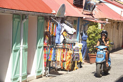 Terre-de-Haute, Les Saintes Islands, Street with a shop and a motor-roller Terre-de-Haute, Guadeloupe, Caribbean Sea, America