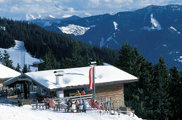 People in front of a ski hut, Wuerstel Stub´n, Saalbach, Salzburger Land, Austria, Europe