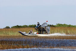 Tourists are making an Airboat Trip, Everglades, Florida, USA