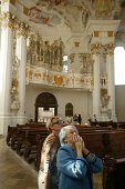 Marvelling ladies in Wieskirche, Steingaden, Bavaria, Germany