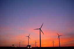 Car in front of a wind park, Wittstock, Mecklenburg-Western Pomerania, Germany