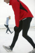 Young couple streching before going running