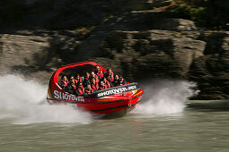 People in a Jetboat on Shotover River, Queenstown, Central Otago, South Island, New Zealand, Oceania
