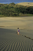 A person on Te Paki sand dune, North Island, New Zealand, Oceania