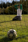 Frustrating young goalkeeper about goal against