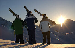 A group of skiers watching the sunset, Skiing, Stubai Valley, Austria