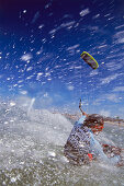 Man kiteboarding in high speed