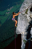 A man freeclimbing at a rock face, Loferer Alp, Salzburger Land, Austria, Europe