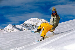 Young woman on skifox moving down, Serfaus, Tyrol, Austria