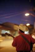 Guitar player at night, Creel, Chihuahua, Mexico