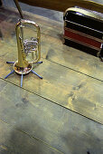 A trumpet and an accordion standing on a wooden stage, Miesbach, Bavaria, Germany