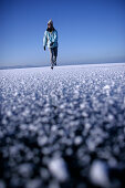 Young woman ice skating