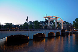 Magere Brug, Amstel, Illuminated Magere Brug Skinny Bridge, in the evening, Amsterdam, Holland, Netherlands