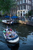 People, Boats, Cafe 't Smalle, Egelantiersgracht, Jordaan, People in leisure boat passing Cafe 't Smalle, Egelantiersgracht, Jordaan, Amsterdam, Holland, Netherlands