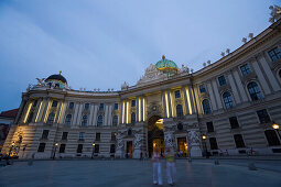 View over Michaelerplatz to Michaelertrakt in the evening, Alte Hofburg, Vienna, Austria