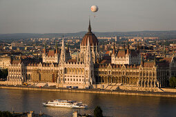 Parliament and Danube river, View to the Parliament and Budapest-Eye balloon over the Danube river, Pest, Budapest, Hungary