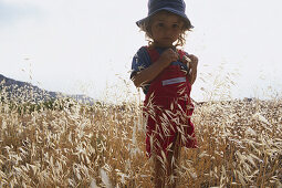 Little girl in oak field