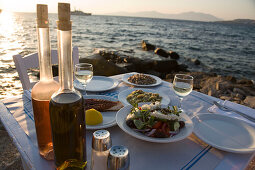 Different greek starters, including salat,  served in the Sea Satin Market Restaurant, Mykonos-Town, Mykonos, Greece