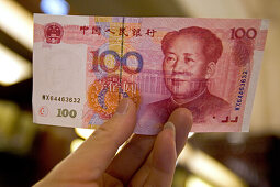 Yuan Geldschein,Yuan, Renminbi (RMB) means "The People's Currency", bank note, portrait of Mao Tse Tung, Mao ist noch auf jedem Geldschein der Volksrepublik, Konterfei des Diktators, Kommunismus, Wasserzeichen, Mao Portrait als Wasserzeichen, Chinese curr