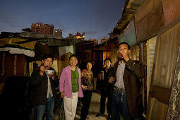 demolitian Hongkou,redevelopment area, living amongst demolished houses, migrant worker, living in demolished houses and self built shacks, slum, Living amongst ruins, dinner