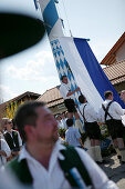 Boys in traditional bavarian clothes at the celebration of 1st May, Muensing, Bavaria, Germany
