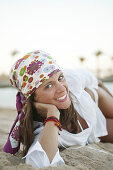 Young woman relaxing on the beach