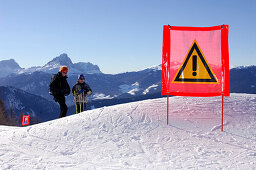 Warning sign in the snow, Gruppo della Marmolata, Dolomites, Italy, Europe