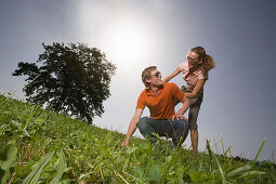 Couple having fun on meadow