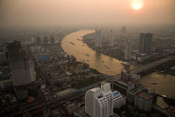 View from State Tower over Bangkok with Menam Chao Phraya River in the evening, Bangkok, Thailand