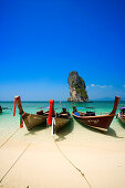 Boats anchored at beach, Ko Poda in background, Laem Phra Nang, Railay, Krabi, Thailand