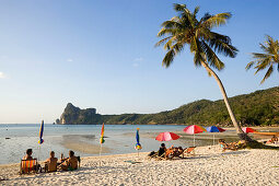 Tourists sunbathing at beach Ao Lo Dalam, Lohdalum Bay, Ko Phi Phi Don, Ko Phi Phi Island, Krabi, Thailand, after the tsunami