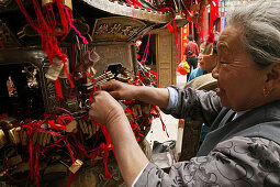 Padlocks and red ribbons are sacrificed for long life, health and wealth, Azure Clouds Temple, Mount Tai, Tai Shan, Shandong province, World Heritage, UNESCO, China