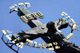 Close up of a cross on Charles Bridge, Prague, Czech Republic