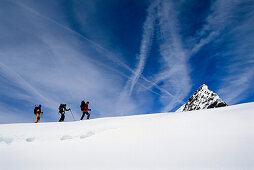 Three people on a skitour, Stubai, Tyrol, Austria