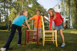 Children playing Musical Chairs, children's birthday party