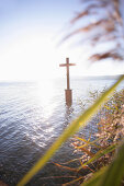 Supposed drowning site of King Ludwig II with cross, Schloss Berg, Lake Starnberg, Bavaria, Germany