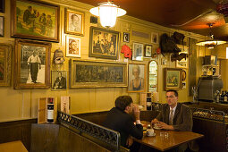 Two men sitting in the restaurant Zum Weissen Kreuz, Zurich, Canton Zurich, Switzerland