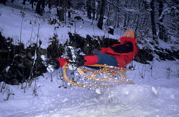 Sledging a jump, Salzburg, Austria