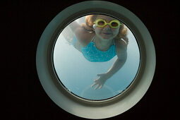 Girl Looking Through Swimming Pool Porthole, Aboard Star Clippers Star Flyer Sailing Ship, Aegean Sea