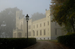 Kittendorf castle in the fog, Stavenhagen, Mecklenburg-Western Pomerania, Germany, Europe