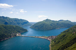 Panoramic view from Monte San Salvatore (912 m) over Motorway, Lake Lugano and Lugano, Ticino, Switzerland