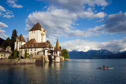 Rowing boat at Castle Oberhofen, Lake Thun, Oberhofen, Bernese Oberland, Canton of Bern, Switzerland