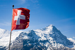 View of Eiger 3970 m and Swiss flag, Grindelwald, Bernese Oberland, Canton of Bern, Switzerland