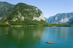 Canoes on lake Hallstatt, Hallstatt, Salzkammergut, Upper Austria, Austria