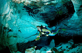 Scuba diver in underwater cave Cueva Taina, Punta Cana, Freshwater, Dominican Republic