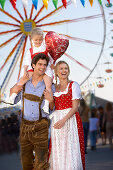 Family enjoying fun fair