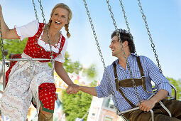 Couple in a chairoplane