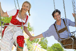 Couple in a chairoplane