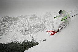 Skier on slope, Castle Mountain ski resort, Alberta, Canada